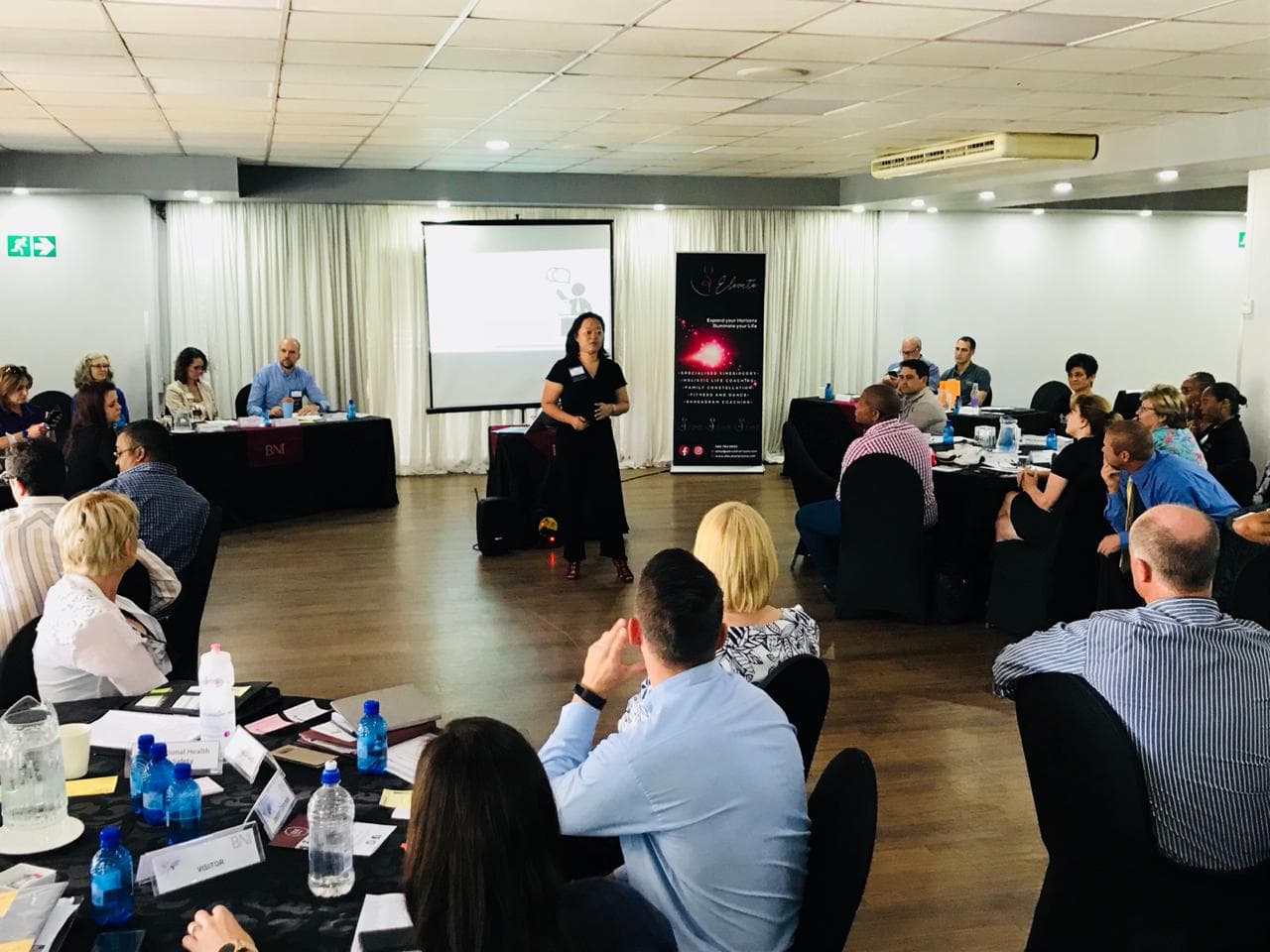 Anita Jack presenting at Elevate wellness event